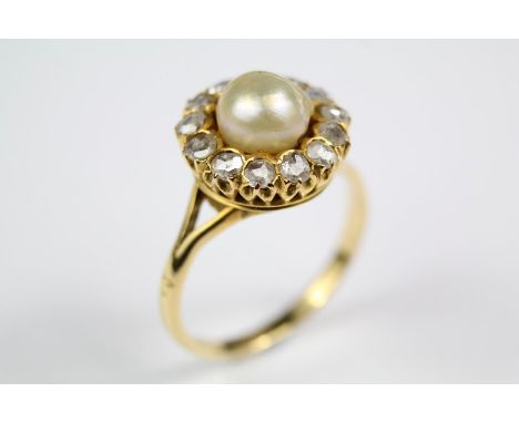 A Lady's Antique 18ct Yellow Gold Pearl and Diamond Ring, the pearl measures approx 8mm and surrounded by 13 rose cut dias of