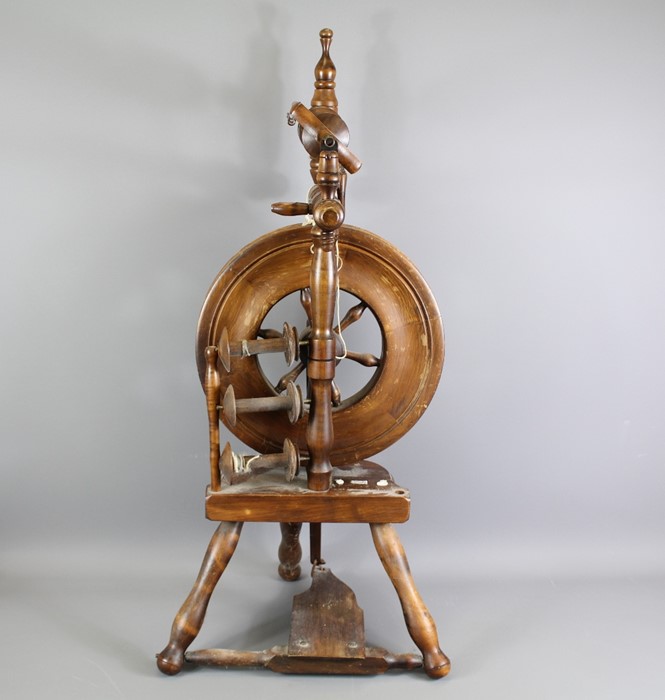 Wee Peggy Spinning Wheel; the spinning wheel is an upright based on the