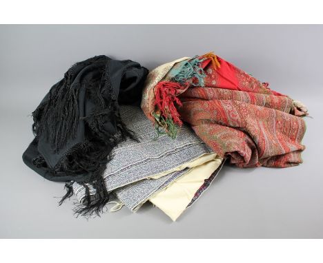 Three Vintage Shawls, this lot includes a black-beaded wool and cotton mourning shawl; a blue and cream wool Paisley shawl an