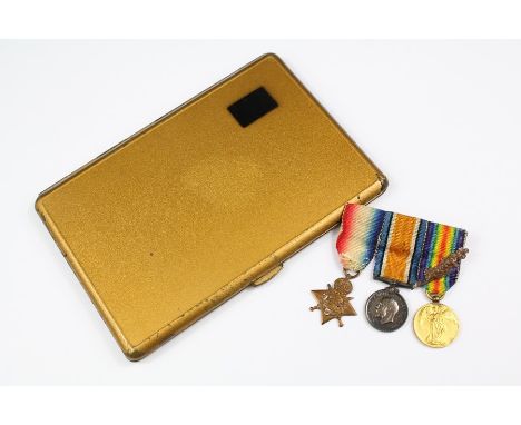 A Set of Miniature Medals; including 1914-15 Star, Great War and the Victory Medals with oak leaf bar, contained in a vintage