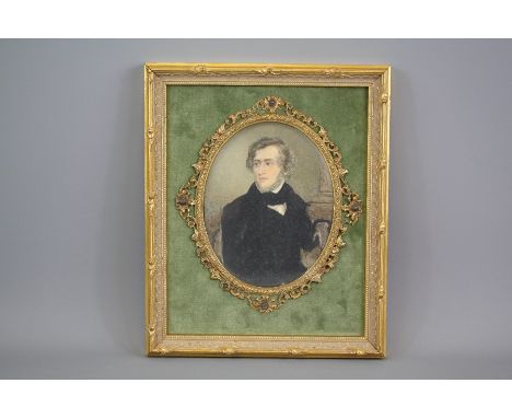A 19th Century Oval Portrait Miniature, depicting a Gentleman, approx 11 x 13 cms, mounted in velvet, framed and glazed, labe