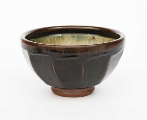 Richard Batterham (1936-2021)a cut-sided stoneware bowl, the interior glazed ash, the exterior black iron,unsigned, paper cat