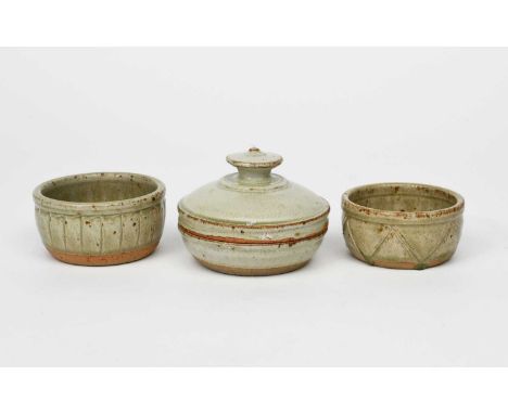 Richard Batterham (1936-2021)a stoneware butterdish and cover, covered in an ash glaze, and two small souffle dishes, with in