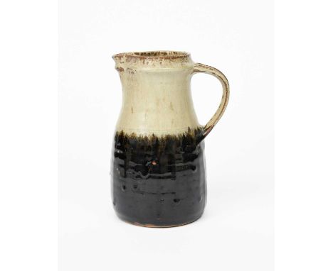 Richard Batterham (1936-2021)a stoneware jug, covered to the neck with an ash glaze, the body with black ironunsigned23.5cm. 