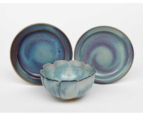 Charles Vyse (1882-1972)a stoneware lotus flower bowl, dated 1938, covered to the foot with a Chun glaze, and two plates by C