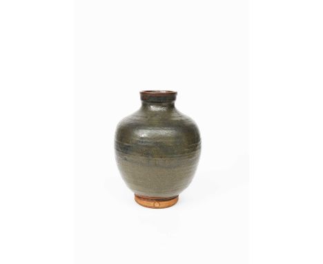 William Staite Murray (1881-1962)a stoneware vase, shouldered form with collar rim, covered to the foot in a green/brown glaz