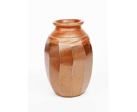 Richard Batterham (1936-2021)a salt-glazed cut-sided stoneware Lily jar, covered in a rust coloured glaze,unsigned, 28cm. hig