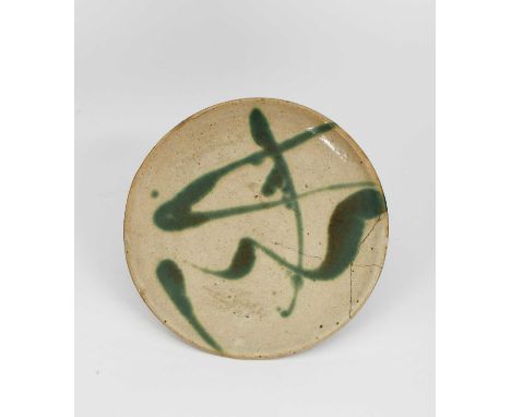 Shoji Hamada (1894-1978)a Mashiko Pottery stoneware plate,with a ladle poured design in green copper Seigi glaze on a nuka gr