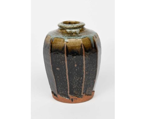 Mike Dodd (born 1943)a cut-sided stoneware vase, covered with an ash glaze to the foot, the shoulder with translucent green r