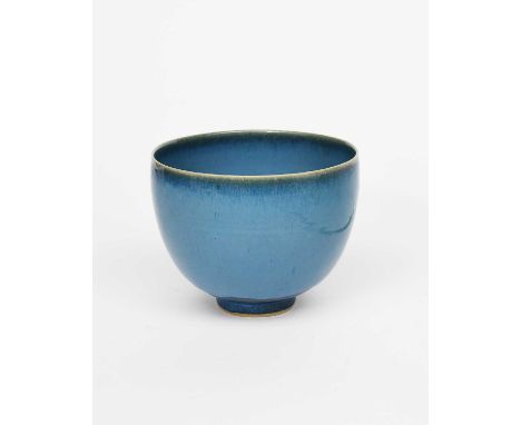 Φ Rupert Spira (born 1960)a footed stoneware bowl, covered in a streaked blue glazeimpressed seal mark, 12cm. highProvenanceT