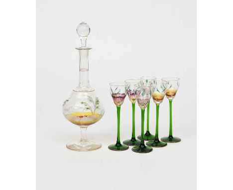 An Art Nouveau Theresienthal enamelled glass decanter and six glasses, enamelled with stylised flower design in red, yellow a