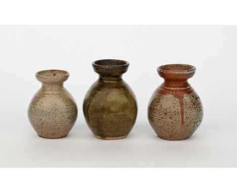 Richard Batterham (1936-2021)a small stoneware flower bottle, covered to the foot with an ash glaze, and two other salt-glaze