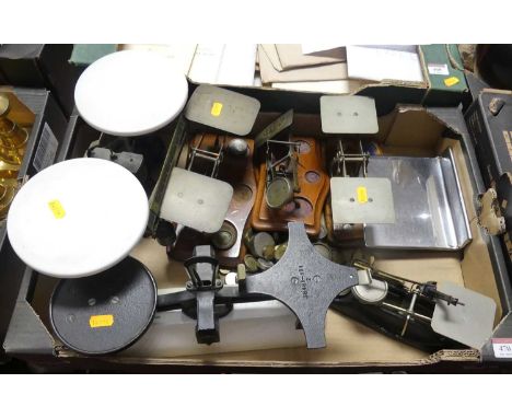 A collection of scales, to include early 20th century postal scales