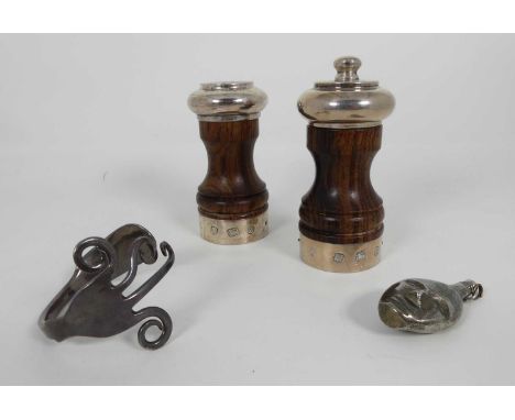 A pair of Elizabeth II silver mounted pepper grinders, London 1978, together with a silver bangle, constructed from a table f