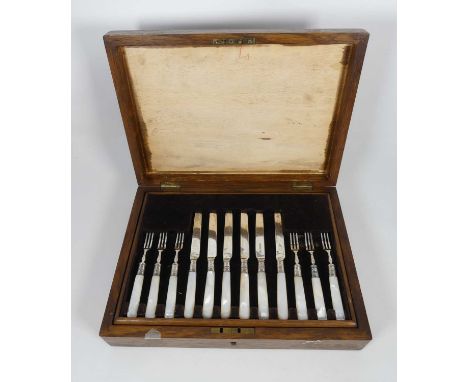 A George V set of silver and mother of pearl handled fruit cutlery, twelve place settings, Alexander Clark &amp; Co Ltd, Shef