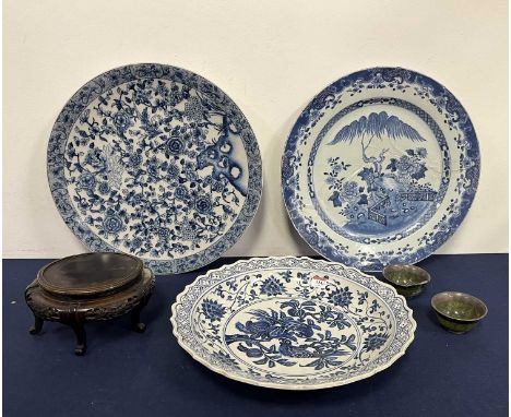 A collection of Oriental items to include 18th century Chinese porcelain charger, dia.46cm (a/f); other ceramics; hardwood st