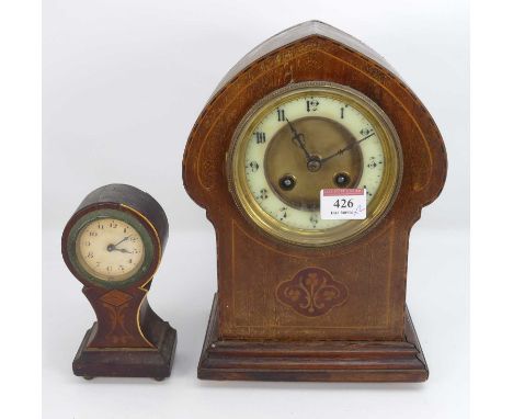 An Edwardian  boxwood strung mantel clock, the enamel chapter ring showing Arabic numerals, having an 8 day movement, height 