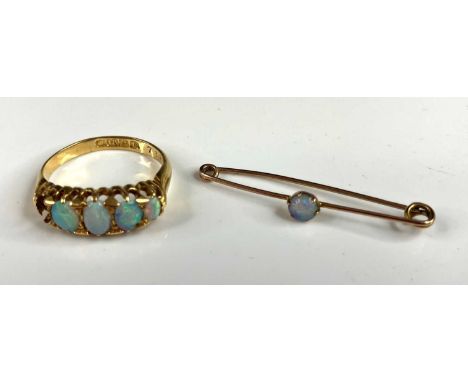 An 18ct gold opal set half-hoop ring (one stone missing), 3.4g, size L; together with a yellow metal opal set safety pin broo