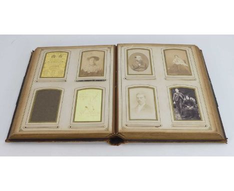 A late Victorian/early 20th century photograph album and contents, namely portrait photographs 