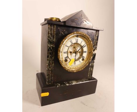 A 19th century slate mantel clock, having a visible escapement and enamelled dial, signed Ansonia Clock Co New York United St