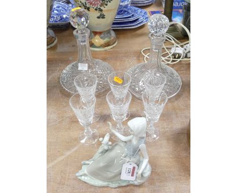 Waterford cut glass ship's decanter and stopper, h.26cm; together with another; a set of six Waterford dessert wine glasses; 