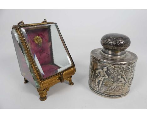 A Victorian silver tea caddy, repousse decorated with figures, Chester 1898, 3.3ozt, together with a gilt metal pocket watch 
