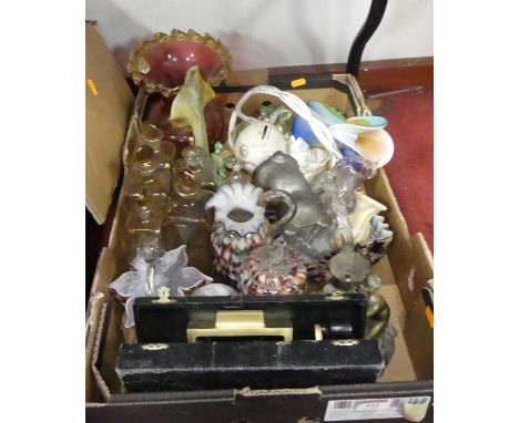 An Art Nouveau painted metal lamp base in the form of a kneeling woman clutching a tulip, h.14.5cm; together with various oth