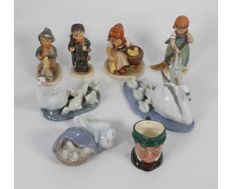 A collection of ceramic figures to include Lladro figure group of a swan and cygnets, height 12cm, and various Goebels figure