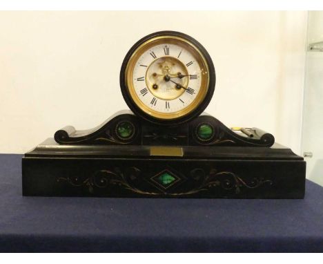 A 19th century black slate and malachite inlaid mantel clock, of drumhead form, the enamelled dial having a visible escapemen