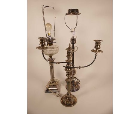 A Victorian silver plated Corinthian column oil lamp, converted, h.54cm; together with another table lamp; and a twin-branch 