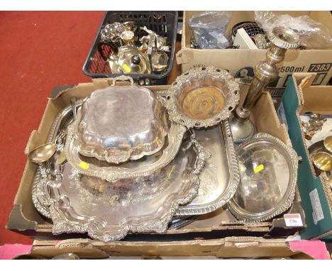 A collection of silver plated wares, to include a Sheffield plated table candlestick, wine coaster, serving tray etc