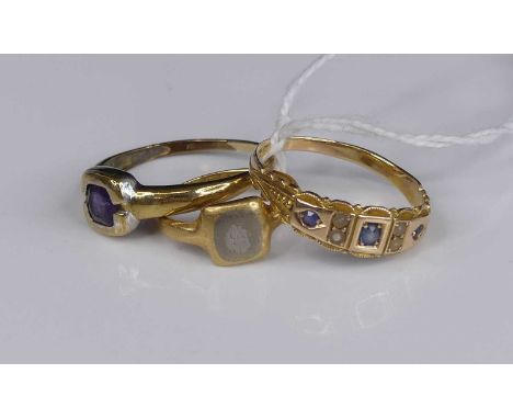 A vintage 15ct gold, sapphire and seed pearl set band ring, size T; together with a child's 18ct gold signet ring, size G; an