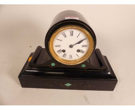 A Victorian black slate and malachite inlaid mantel clock, of drumhead form, having a white enamelled dial showing Roman nume