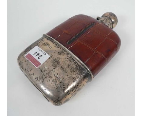 A 20th century silver and leather clad hip flask, marks rubbed, height 18cm