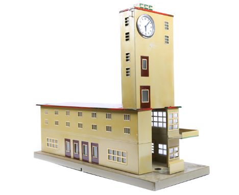 An impressive late 1950’s early 1960’s Marklin O gauge mainline station, (Friedrichshafen?). A tinplate building (54cm) in an