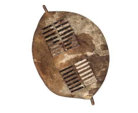 A small Shazi shield of grey and brown hide, slotted central panel, darkwood stick, 19” x 15”. GC Plate 5   