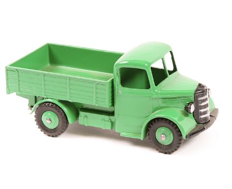 A Dinky Toys Bedford Truck (411). An example in overall mid green with mid green wheels. A Mint example. Plate 7             