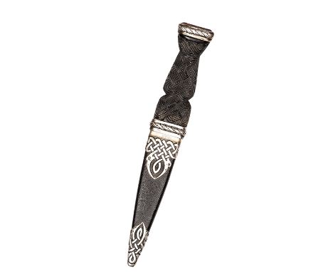 A silver mounted skean dhu, blade 3¼”, scalloped along half of the back edge, darkwood grip with strapwork to outer face and 