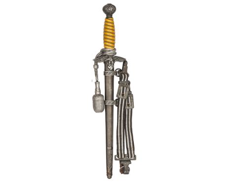 A Third Reich 2nd pattern Luftwaffe officer’s dagger, by Puma, with pale orange grip and portepee, in its sheath with hanging