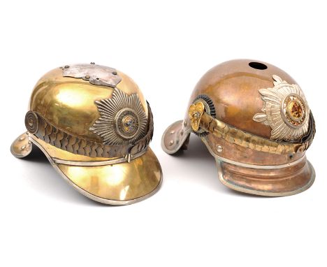 A copy of a Prussian Garde du Corps tombak helmet, with gilt chinscales, enamelled centre to star and silk lining (no eagle c