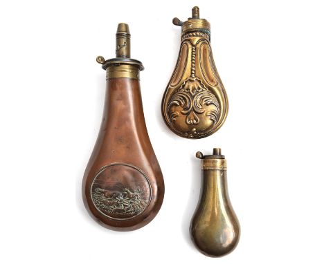 A plain brass/copper pistol flask, 4¼” overall, with small non adjustable charger, GC minor dents; an embossed brass flask “P