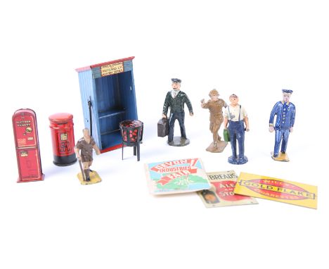 A quantity of Hornby O and OO gauge railway figures. Station Master, station staff with luggage, porter with trolley, porters