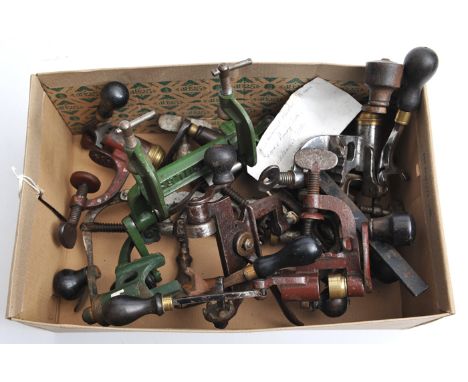 11 various old bench mounting cartridge roll turnover tools, including 3 conventional 12 bore and a 20  bore, with brass turn