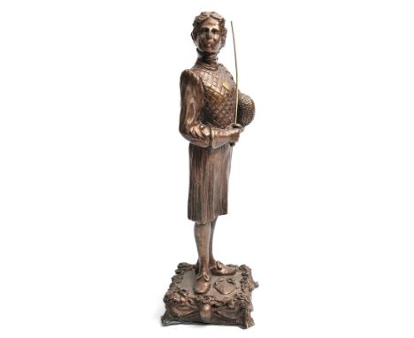 A French hollow cast bronzed figure “Assaut de Sabre”, in fencing outfit brandishing foil, helmet and glove at his feet, on b