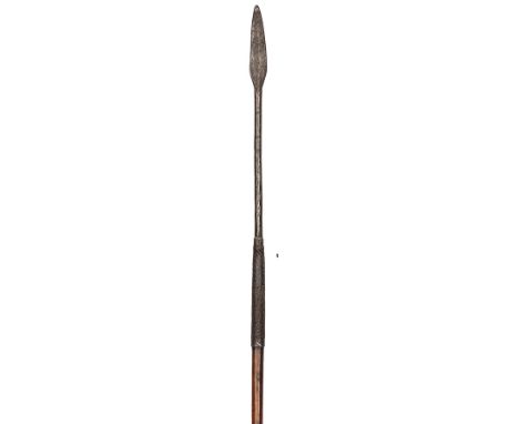 A Zulu assegai, small leaf shaped blade on socket, fine copper wire binding onto haft with flared base, 48½” overall. GC, goo