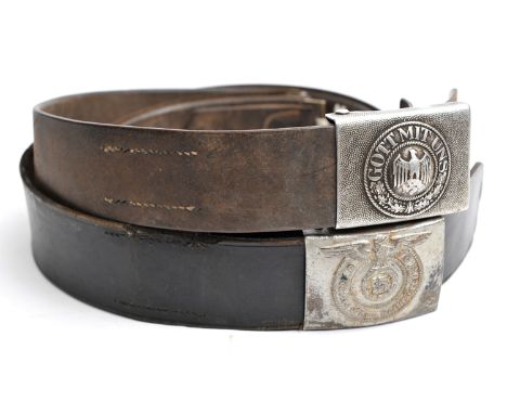 A Third Reich SS silvered steel buckle, the reverse with RZM and SS marks and “36/42”, on its leather belt stamped with RZM m