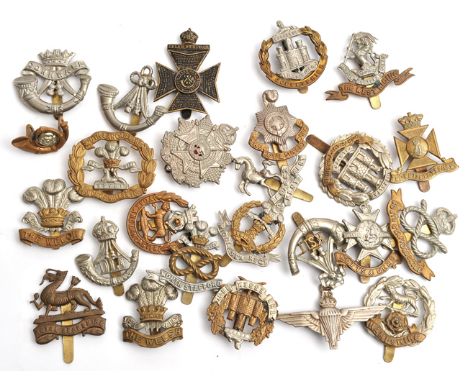 25 different infantry cap badges, including DCLI, R Sussex, Hampshire, Welsh and Welch, Essex, Northants, R W Kent, KSLI, KRR
