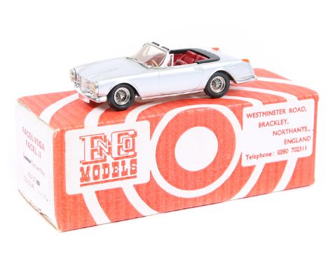 An EnCo Facel Vega Facel 11. A convertible in metallic silver with deep red interior and black roof tonneau. Fitted with spok