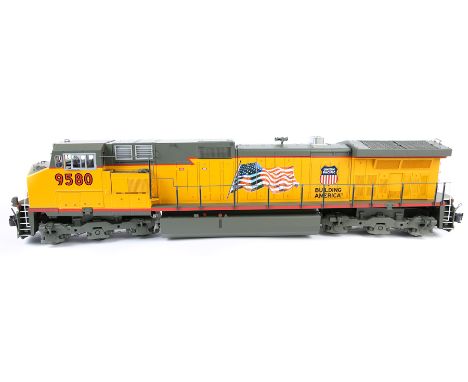 An Aristo Craft Trains gauge 1 Dash-9 Diesel Locomotive. (Art-23010) RN9580. A Co-Co diesel finished in yellow and grey with 