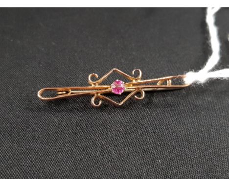 9 CARAT GOLD RUBY BAR BROOCH 